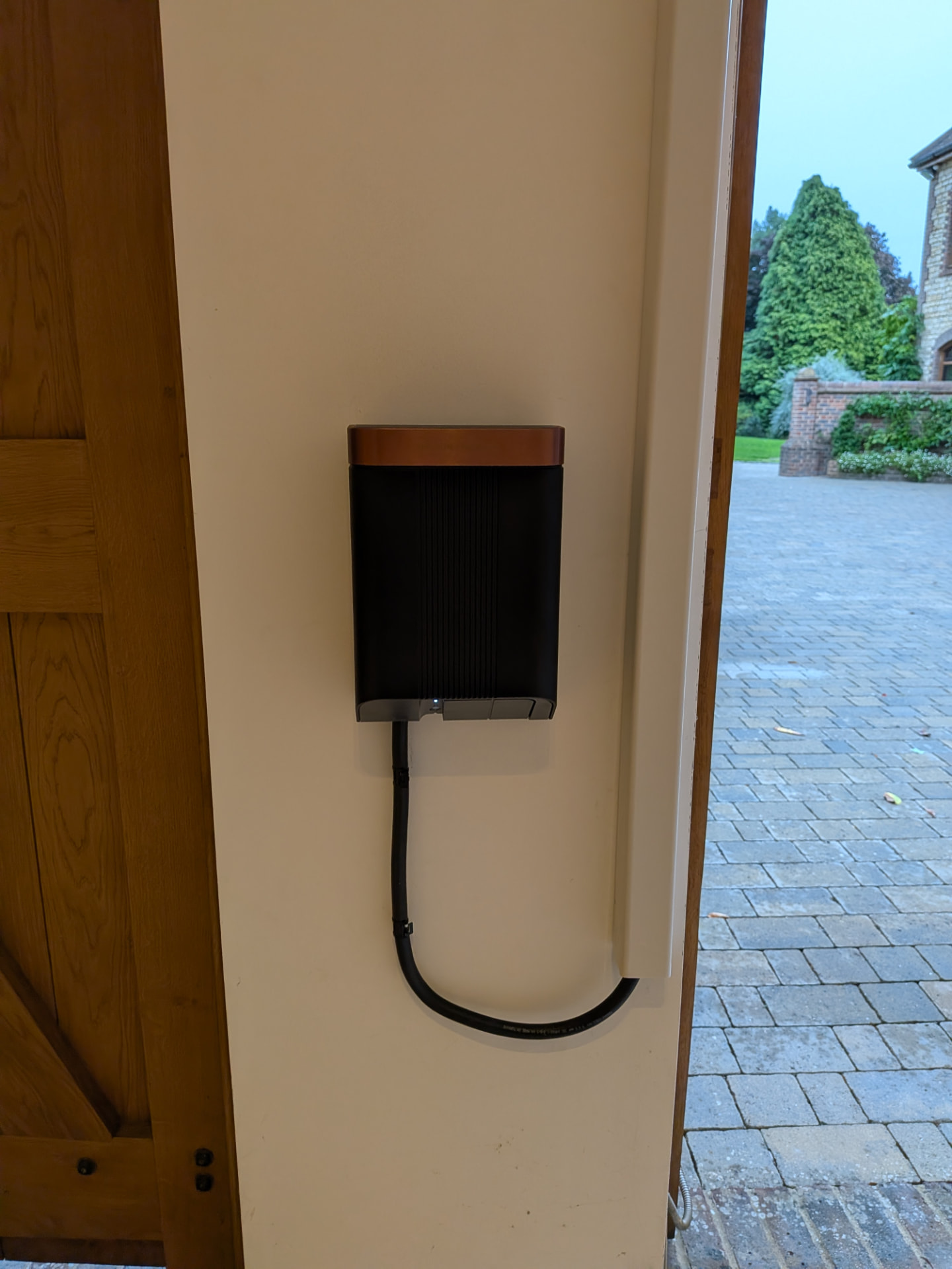 Simpson & Partners charger, discreetly wall-mounted, Surrey